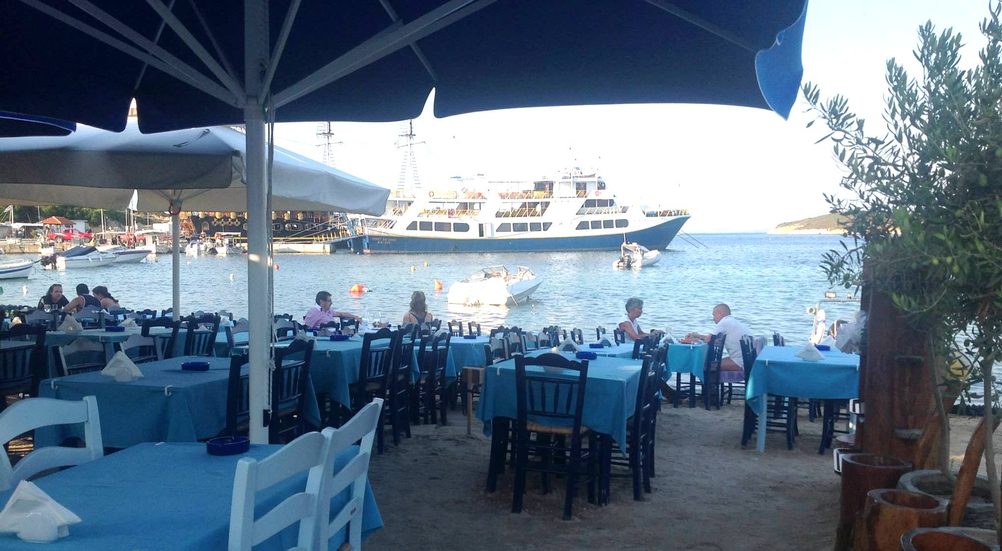 Aristos fish restaurant on the sand and the port