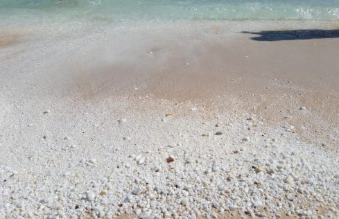 Snowwhite marble pebbles at Marble beach by placescases.com