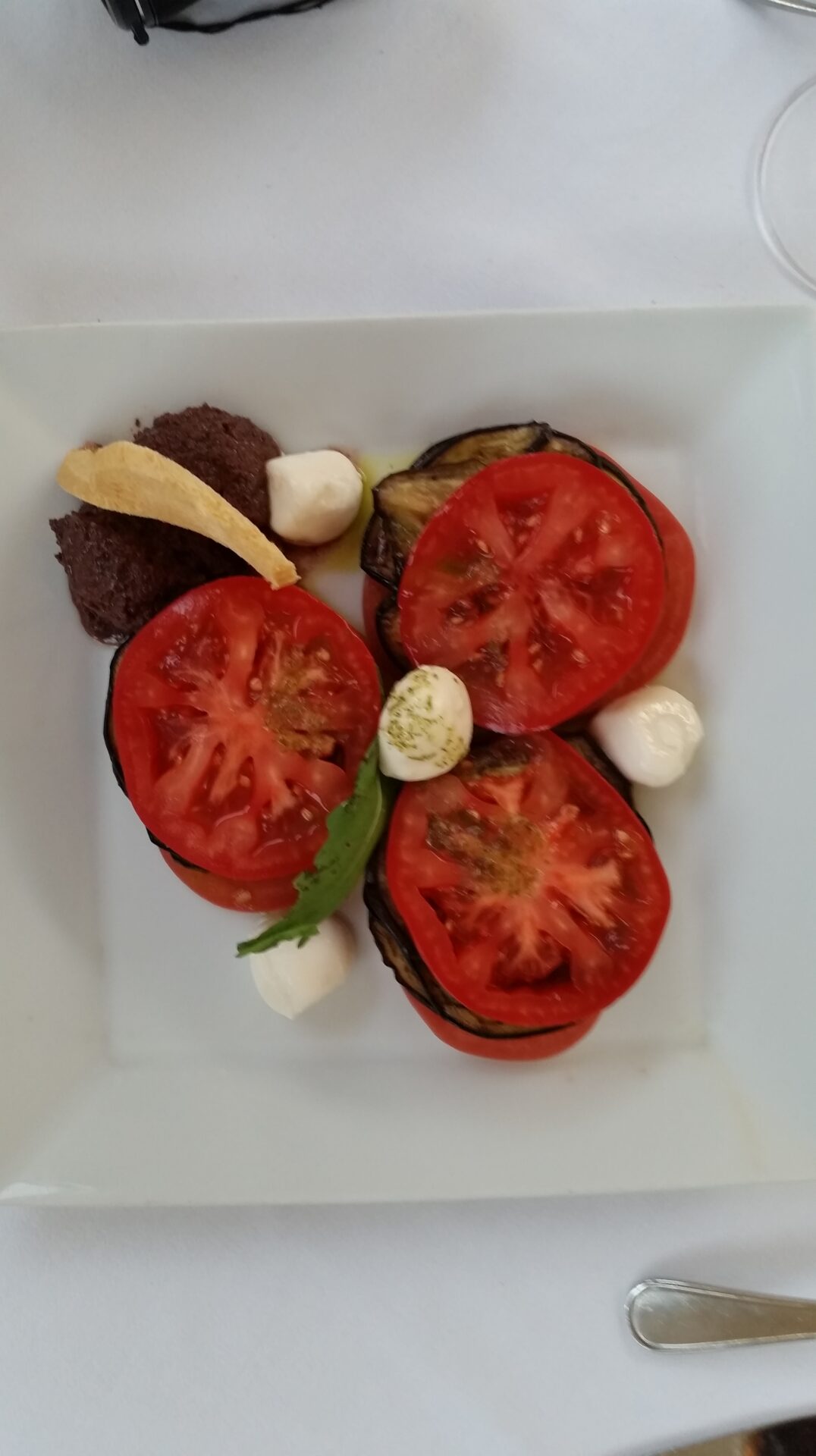 Tomato and egg plant salad at Salini by placescases.com