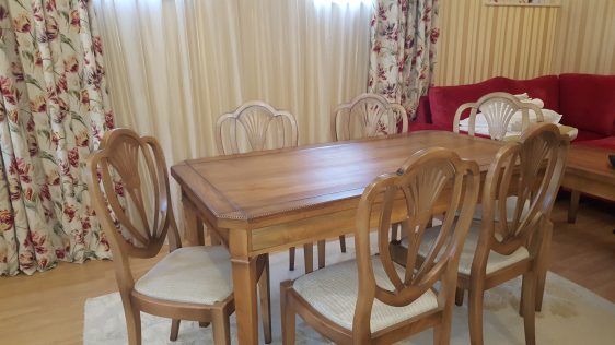 Table at the living room of guest house Midalidare Hotel by placescases.com